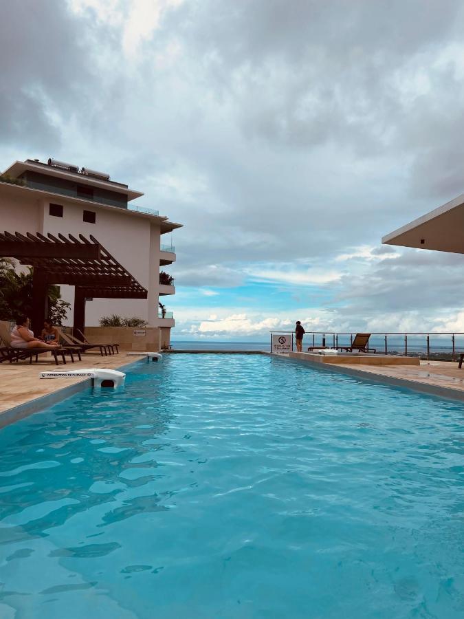 Meherio - Bel Appartement Vue Mer A Tahiti ปาเปเอเต ภายนอก รูปภาพ